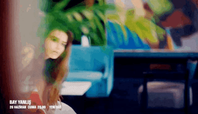 a blurred image of a woman with the words bay yanlis on the bottom