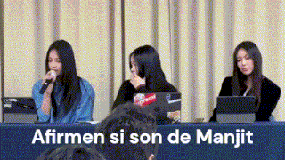 a group of women are sitting at a table with laptops and a sign that says affirmen si son de manjit