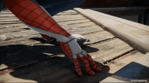 a close up of a spider man 's hand with a 2017 marvel logo in the background
