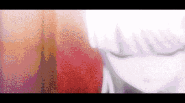 a close up of a person 's face with a blurred background
