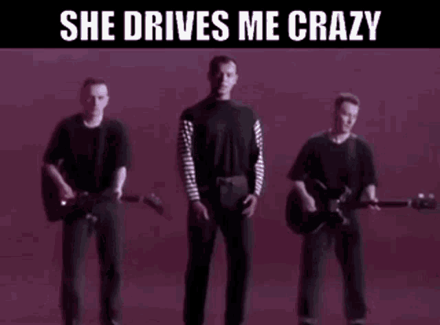 three men playing guitars in front of a purple wall with the words she drives me crazy
