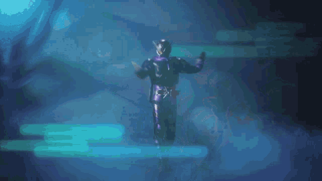 a person holding a sword in front of a star