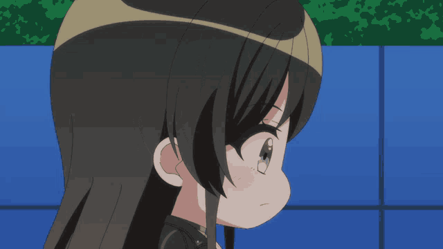 a close up of a girl 's face with closed eyes