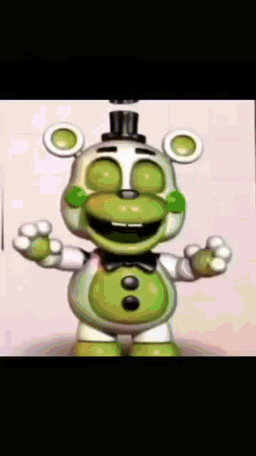 a green and white teddy bear with a top hat on .