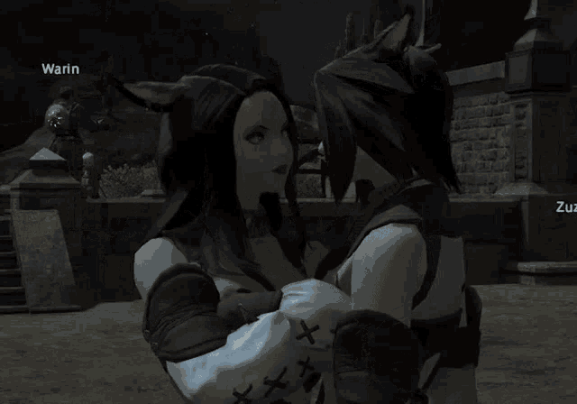 a couple of women with cat ears are kissing in a video game
