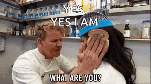 a man is holding a piece of bread over a woman 's ear and says " yes i am "