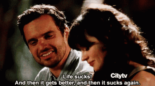 a man and a woman are looking at each other and the woman is saying life sucks