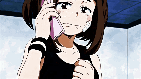 a girl in an anime is talking on a cell phone