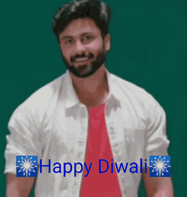 a man wearing a white shirt and a red shirt with the words happy diwali written on it
