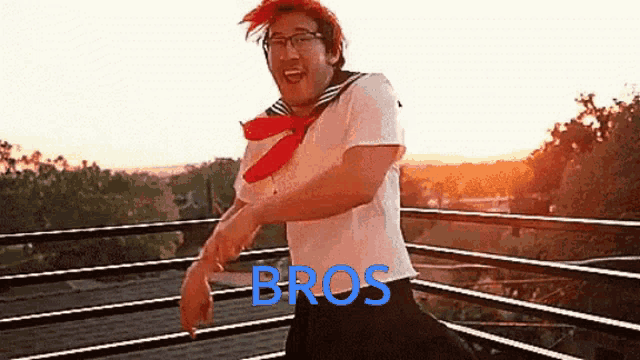 a man in a sailor outfit is dancing on a balcony with the word bros written on the bottom