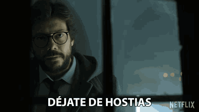 a man wearing glasses and a tie looks out a window with the words dejate de hostias written on the bottom