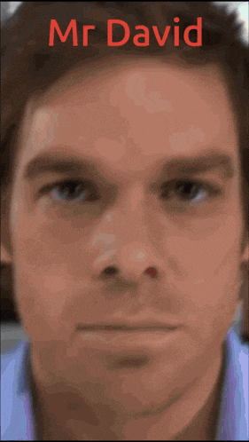 a close up of a man 's face with the name mr david on the top