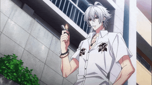 a man in a white shirt is smoking a cigarette