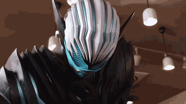 a statue of a monster with a blue and white helmet on