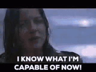 a close up of a woman 's face with the words `` i know what i 'm capable of now ! ''