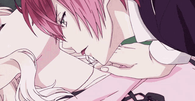 a man with pink hair is laying on a woman 's chest