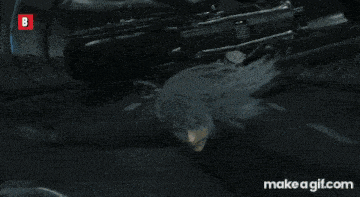 a close up of a person welding a piece of metal with a make a gif.com logo in the corner .