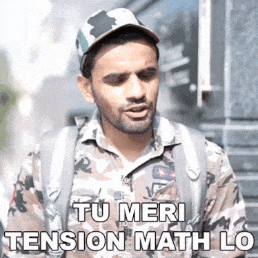 a man wearing a hat and a shirt that says tu meri tension math lo