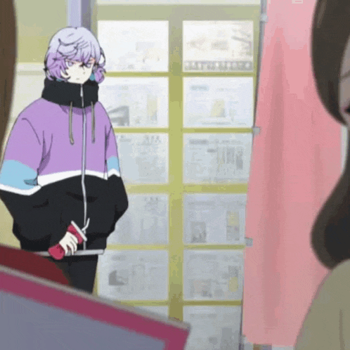 a girl in a purple and black jacket is standing in front of a wall of papers