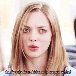 a blonde woman is asking if she is from africa