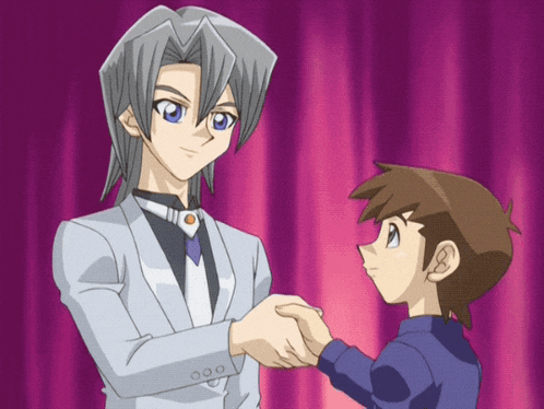 a man and a boy shake hands in front of a purple curtain
