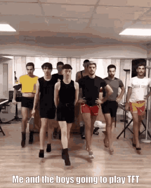 a group of men are dancing in a room with the words me and the boys going to play tft on the bottom