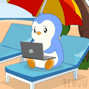 a penguin is sitting on a beach chair using a laptop computer