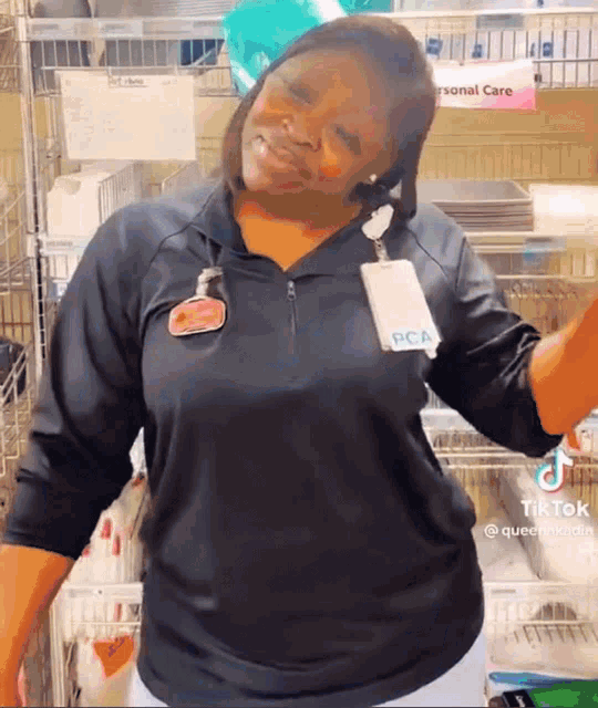 a woman with a name tag that says pca