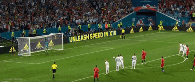 a soccer field with a sign that says unleash speed in x16