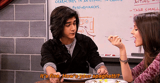 a man and a woman are eating spaghetti in front of a whiteboard that says characters in an airport to create performances