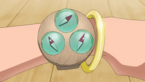a cartoon drawing of a watch with three compasses on it