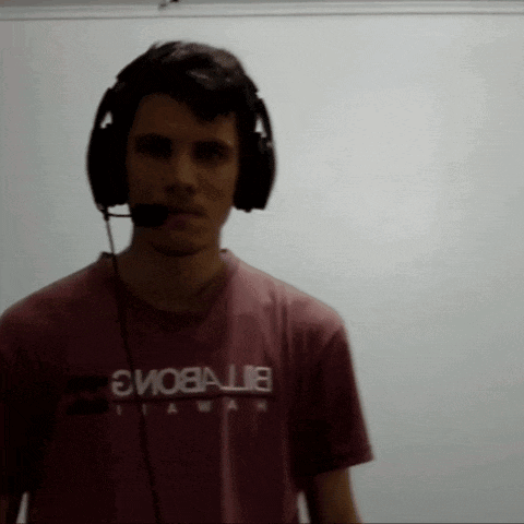a man wearing headphones and a t-shirt that says " bitvboing " on it