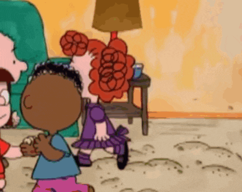 a cartoon of peanuts characters hugging each other in a living room