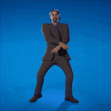 a man in a suit is jumping in the air with his arms outstretched