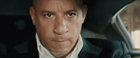 a close up of a man 's face in a car .