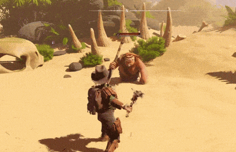 a video game shows a cowboy fighting a monster in the sand