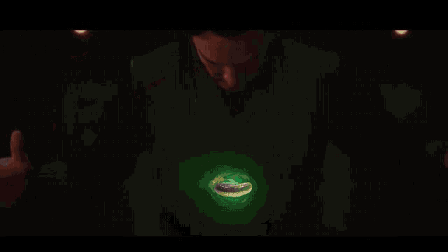 doctor strange is giving the middle finger while wearing a green cape .