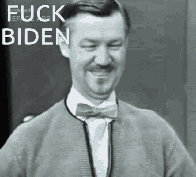 a black and white photo of a man with the words " fuck biden " on the bottom