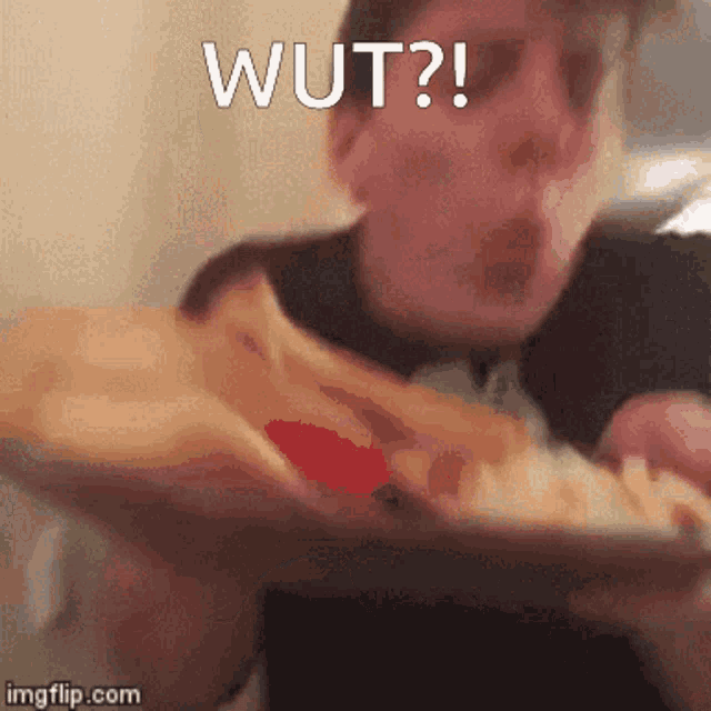 a boy is eating a slice of pizza with the words wut written on the bottom .