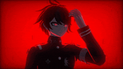 a close up of a person 's face with a red background