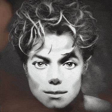 a close up of a person 's face with their eyes closed