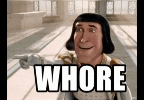 shrek from shrek is pointing at the word whore in a room .