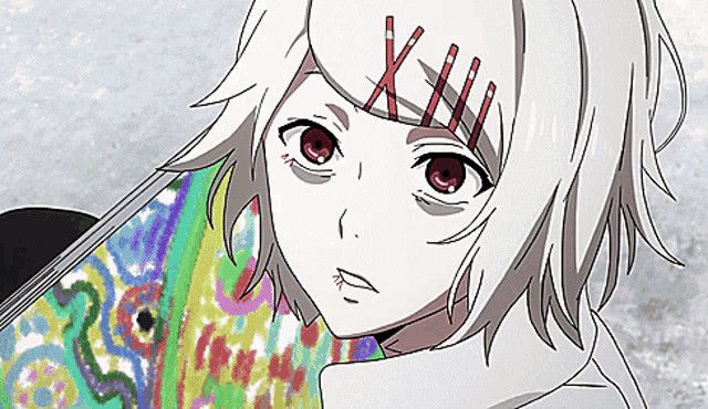 a girl with white hair and red eyes is holding a skateboard and looking at the camera .