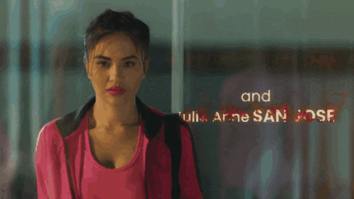 a blurred image of a woman with julie anne san jose in the lower right corner