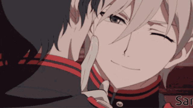 a close up of two anime characters with the word san in the bottom right corner