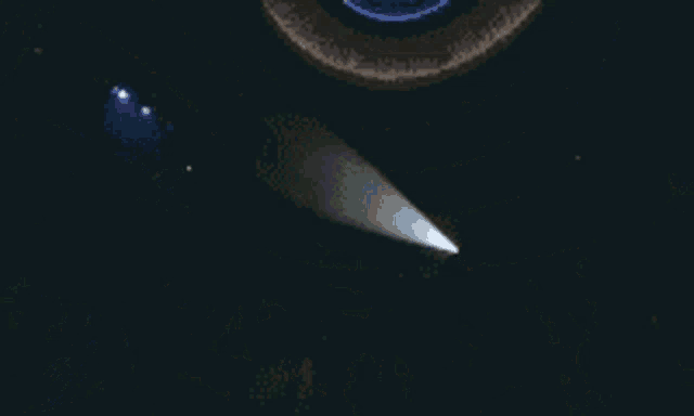 a pixelated image of a stage with a spotlight shining on the audience