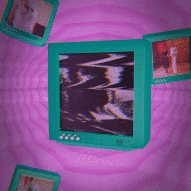 a computer monitor with a purple background surrounded by pictures
