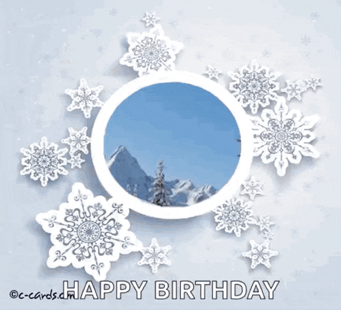 a happy birthday card with a picture of a snowy mountain surrounded by snowflakes
