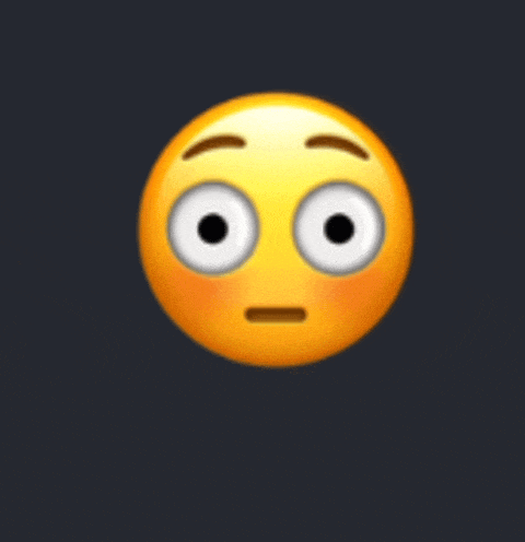 a yellow smiley face with big eyes and a surprised expression