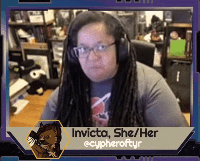 a woman wearing headphones has the name invicta on the bottom